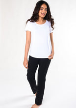 Your basic comfy tee, Brenda U Neck is easy-going, with all the right features: flattering U-neck line, classic-soft viscose from bamboo jersey, high-low hem for extra coverage at the back. Pair it with leggings for working out, jeans for staying casual. Fabrication: 95% Viscose from Bamboo 5% Spandex Terrera $50.00 White