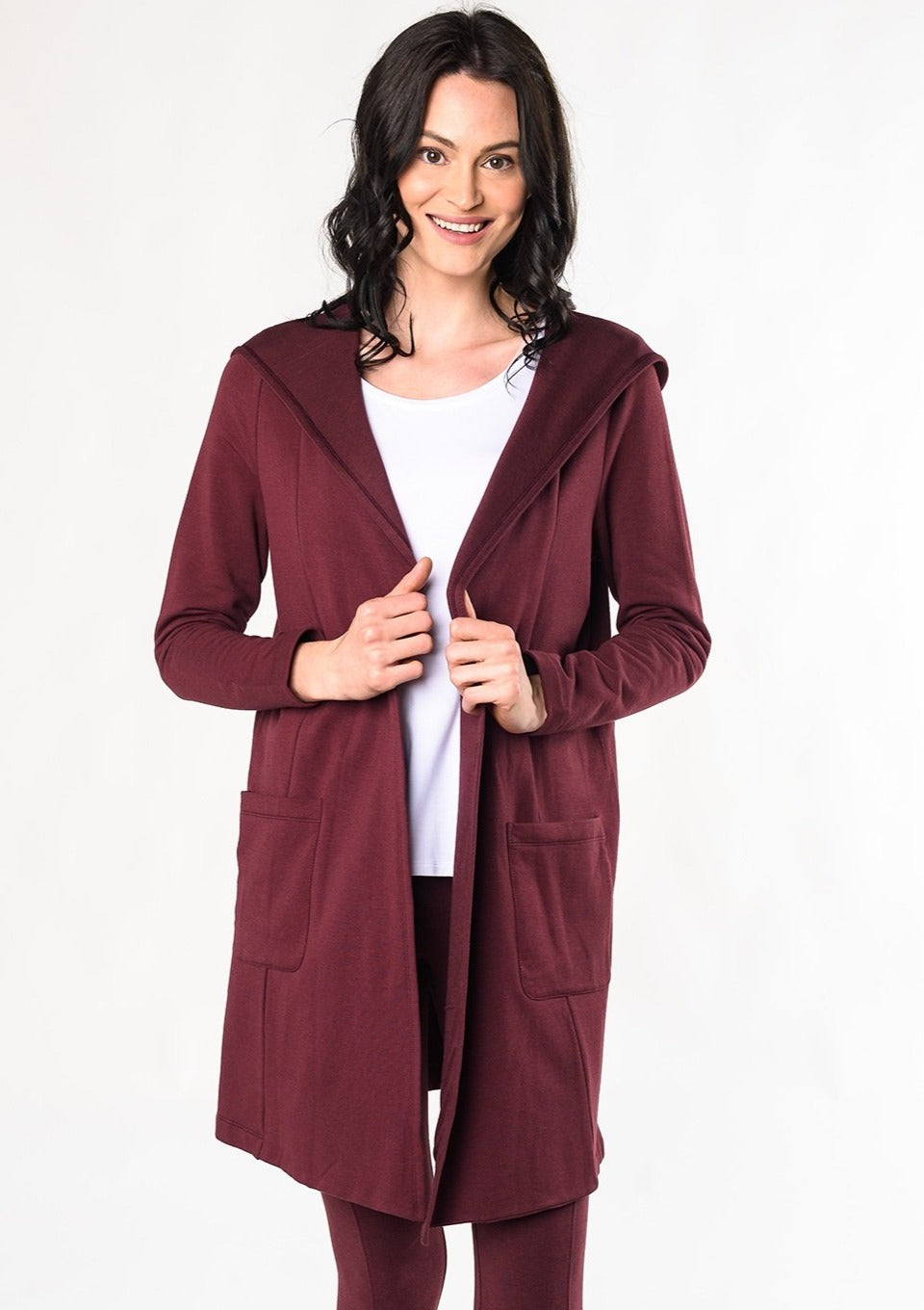 An easy open-front cardigan for every-day layering. Made with a cozy-soft organic fleece that feels like a warm hug on the body. Fabrication: 66% Viscose from Bamboo, 28% Cotton, 6% Spandex $135.00  wine red