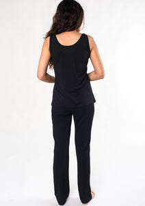 An essential scoop-neck tank designed to fit all body types. This elevated sleeveless tank is made from our organic viscose from bamboo that is soft and smooth to the touch.  Fabrication: 95% Viscose from bamboo, 5% Spandex $50.00 black