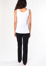 An essential scoop-neck tank designed to fit all body types. This elevated sleeveless tank is made from our organic viscose from bamboo that is soft and smooth to the touch.  Fabrication: 95% Viscose from bamboo, 5% Spandex $50.00 white