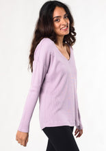You’ll love this sustainable waffle fabric that is gentle, stretchy, and soft on the skin. Designed with flattering forward-front seams, relaxed fit, and a v-neck. Fabrication: 68% Viscose from bamboo, 28% cotton 4% $75.00 lilac purple