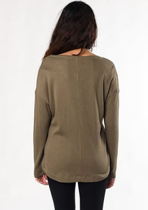 You’ll love this sustainable waffle fabric that is gentle, stretchy, and soft on the skin. Designed with flattering forward-front seams, relaxed fit, and a v-neck. Fabrication: 68% Viscose from bamboo, 28% cotton 4% $75.00 moss green