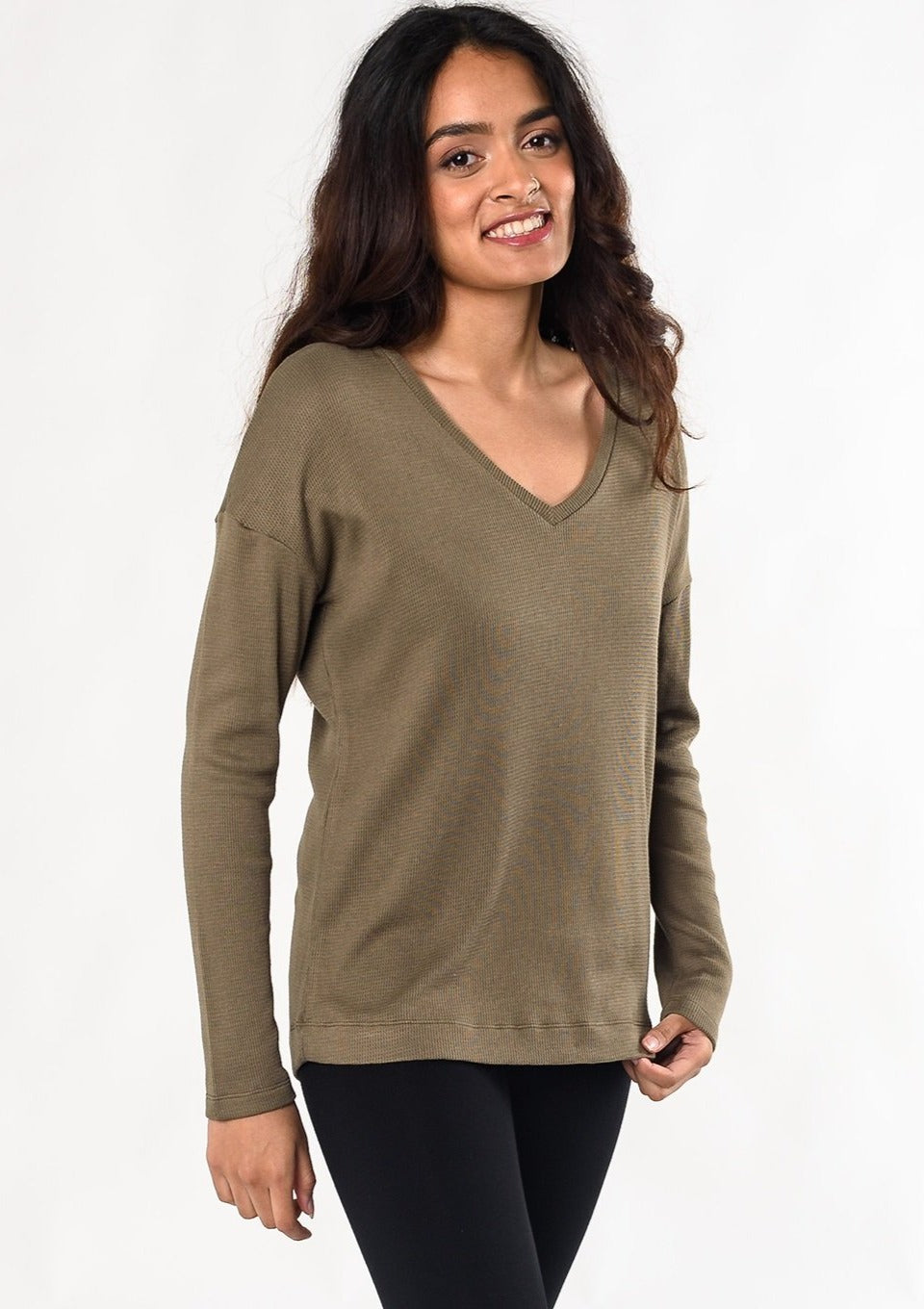 You’ll love this sustainable waffle fabric that is gentle, stretchy, and soft on the skin. Designed with flattering forward-front seams, relaxed fit, and a v-neck. Fabrication: 68% Viscose from bamboo, 28% cotton 4% $75.00 moss green