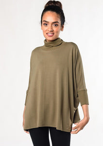 The Colleen top is a fan-favourite mock-neck top updated into a contemporary look. With continuous dolman sleeves and a soft ribbed trim, this french-terry top is an elegant way to stay warm and look Fabulous! Fabrication: 95% Viscose from Bamboo 5% Spandex $95.00 Moss Green