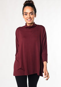 The Colleen top is a fan-favourite mock-neck top updated into a contemporary look. With continuous dolman sleeves and a soft ribbed trim, this french-terry top is an elegant way to stay warm and look Fabulous! Fabrication: 95% Viscose from Bamboo 5% Spandex $95.00 Wine Red