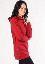 The Gemma is a warm and functional hooded tunic. Great with any pants, it is designed with a longer body so you can easily pair with leggings. Featuring versatile side-snap buttons to change the fit and style to your liking. Fabrication: : 66% Viscose from Bamboo 28% Cotton 6% Spandex Fleece $115.00 ruby red