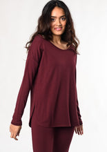 The Jordan is a relaxed long sleeve tee that is simple yet full of special details. The Jordan tee has high-low curved hems, side slits, and a touch of ribbed detailing along the neckline. You can pair this tee with jeans or leggings and wear it under a cardigan for added warmth. Fabrication: 95% Viscose from Bamboo 5% Spandex $70.00  wine red