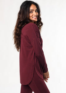 The Jordan is a relaxed long sleeve tee that is simple yet full of special details. The Jordan tee has high-low curved hems, side slits, and a touch of ribbed detailing along the neckline. You can pair this tee with jeans or leggings and wear it under a cardigan for added warmth. Fabrication: 95% Viscose from Bamboo 5% Spandex $70.00  wine red