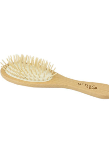 With 90 stimulating wooden pegs, introducing the Massaging Hair Brush! A magical cushioned brush that glides through hair distributing natural oils, improving circulation and giving you the best head massage you've had outside of a salon.  The handle is easy to hold and maneuver. Compact enough to pack when traveling for business or pleasure. All-natural Anti-static Vegan Certified $12.00