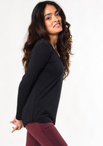 The Melody long sleeve tee has a flattering scoop neck-line and curved high-low hem. This ultra-soft, lightweight basic t-shirt will be a mainstay in your closet for all seasons.  Fabrication: 95% Viscose from Bamboo 5% Spandex $65.00 Black