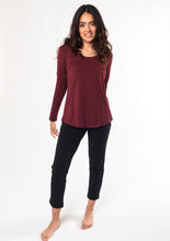 The Melody long sleeve tee has a flattering scoop neck-line and curved high-low hem. This ultra-soft, lightweight basic t-shirt will be a mainstay in your closet for all seasons.  Fabrication: 95% Viscose from Bamboo 5% Spandex $65.00 Wine Red