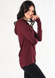 Move freely in this pull-on tunic hoodie. Designed with flattering front-seam details, cascading ruching in the back, and a longer length for hip and bum coverage. Make a match with the Ruched Movement Legging. Fabrication: 95% Viscose from Bamboo 5% Spandex $110.00 wine red