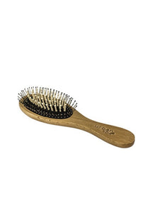 Untangle and massages with the Smooth-as-Silk Hair Brush. Wooden pegs and capped bristles glide through locks, distributing natural hair oils and styling products to those hard-to-reach ends.  High-performance brush. All-natural. Anti-static. Suitable for long, curly, and thick hair. $12.00