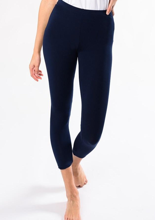 Suri Capri Leggings are comfortable, flexible and breathable. Made with oh-so-soft Viscose from Bamboo, this is a great gift for yourself, family or friends. Lightweight yet opaque, they are great to pair with a tunic, tank, t-shirt or blouse. You will Love your Suri  Capri Bamboo Leggings. Fabrication 94% Viscose from Bamboo, 6% Spandex TERRERA ink blue $43.00
