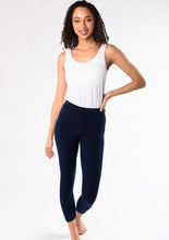 Suri Capri Leggings are comfortable, flexible and breathable. Made with oh-so-soft Viscose from Bamboo, this is a great gift for yourself, family or friends. Lightweight yet opaque, they are great to pair with a tunic, tank, t-shirt or blouse. You will Love your Suri  Capri Bamboo Leggings. Fabrication 94% Viscose from Bamboo, 6% Spandex TERRERA Ink Blue $43.00
