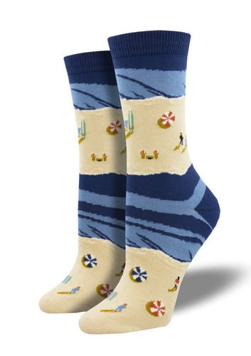 Blue with a sandy beach scene. Soft, Breathable, Moisture Wicking, Antibacterial, Hypoallergenic, Amazing Socks! One Size Fits Most (Women's 5-11) Fabrication: 66% Rayon from Bamboo, 32% Nylon, 2% Spandex SockSmith $22.00