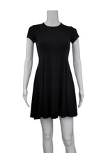  The Black Bamboo Swing Dress is a simple and elegant style with a luxurious look and feel. A compliment to all body shapes with its princess line fit, round neck and short sleeve. Proudly made in Canada 92% rayon from bamboo 8% Spandex  Eco-Essentials black $75.00