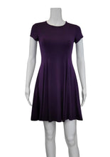  The ﻿Plum Purple Bamboo Swing Dress is a simple and elegant style with a luxurious look and feel. A compliment to all body shapes with its princess line fit, round neck and short sleeve. Proudly made in Canada 92% rayon from bamboo 8% Spandex  Eco-Essentials plum purple $75.00