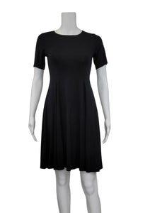 The ﻿Black Bamboo Twirl Dress is a simple and elegant style with a luxurious look and feel. Similar to the Swing Dress, it is a compliment to all body shapes with its princess line fit, round neck, 3/4 sleeve and 3" more in length then the swing dress. Proudly made in Canada 92% rayon from bamboo, 8% Spandex  Eco-Essentials black $80.00